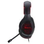 Xtrike Me GH-710 wired gaming headset, close-up of illuminated earcup and flexible noise-cancelling microphone.